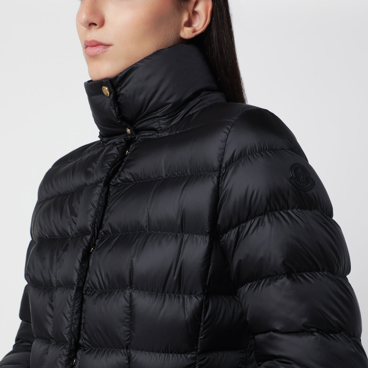 Lange schwarze Daunenjacke aus Nylon