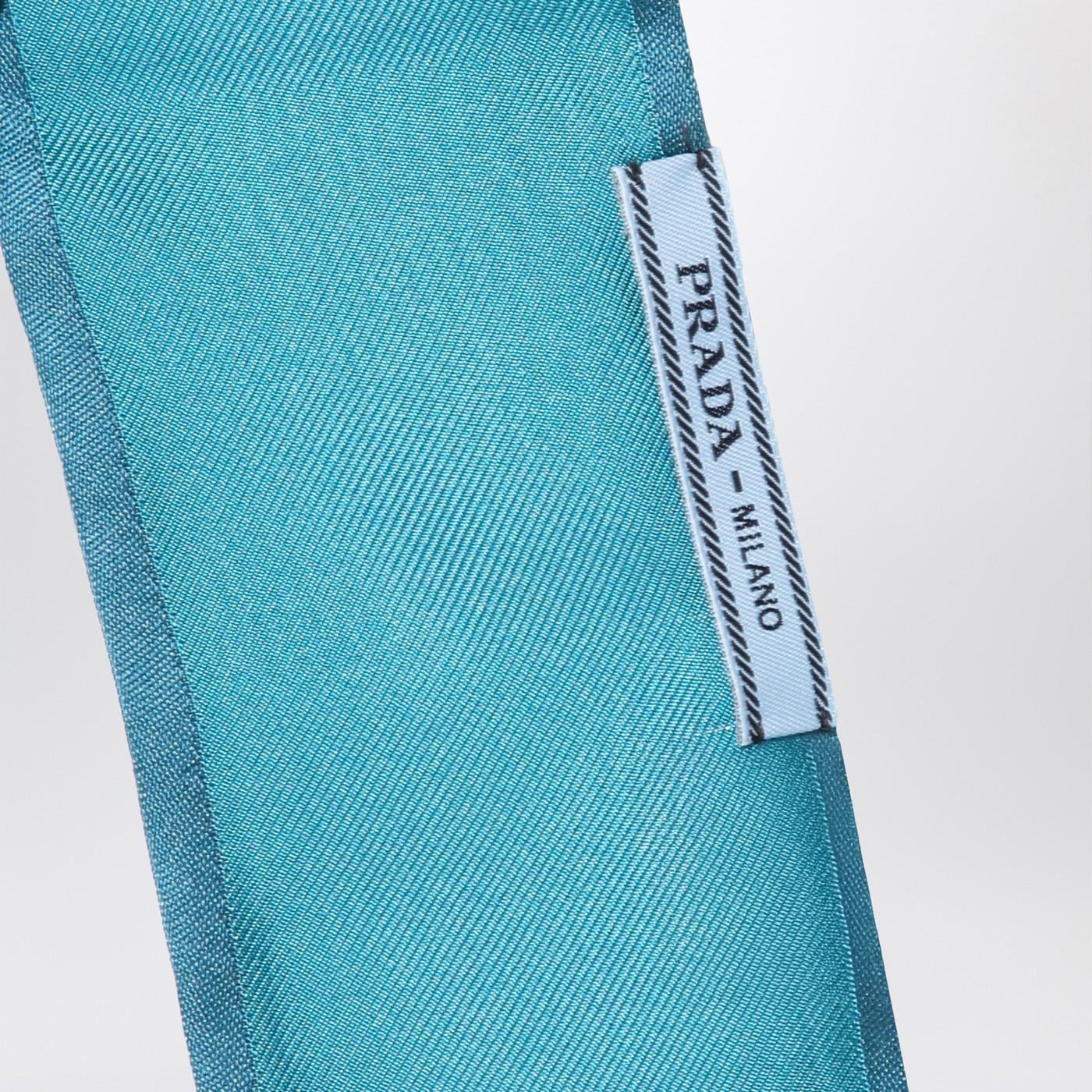 Turquoise ribbon in silk twill