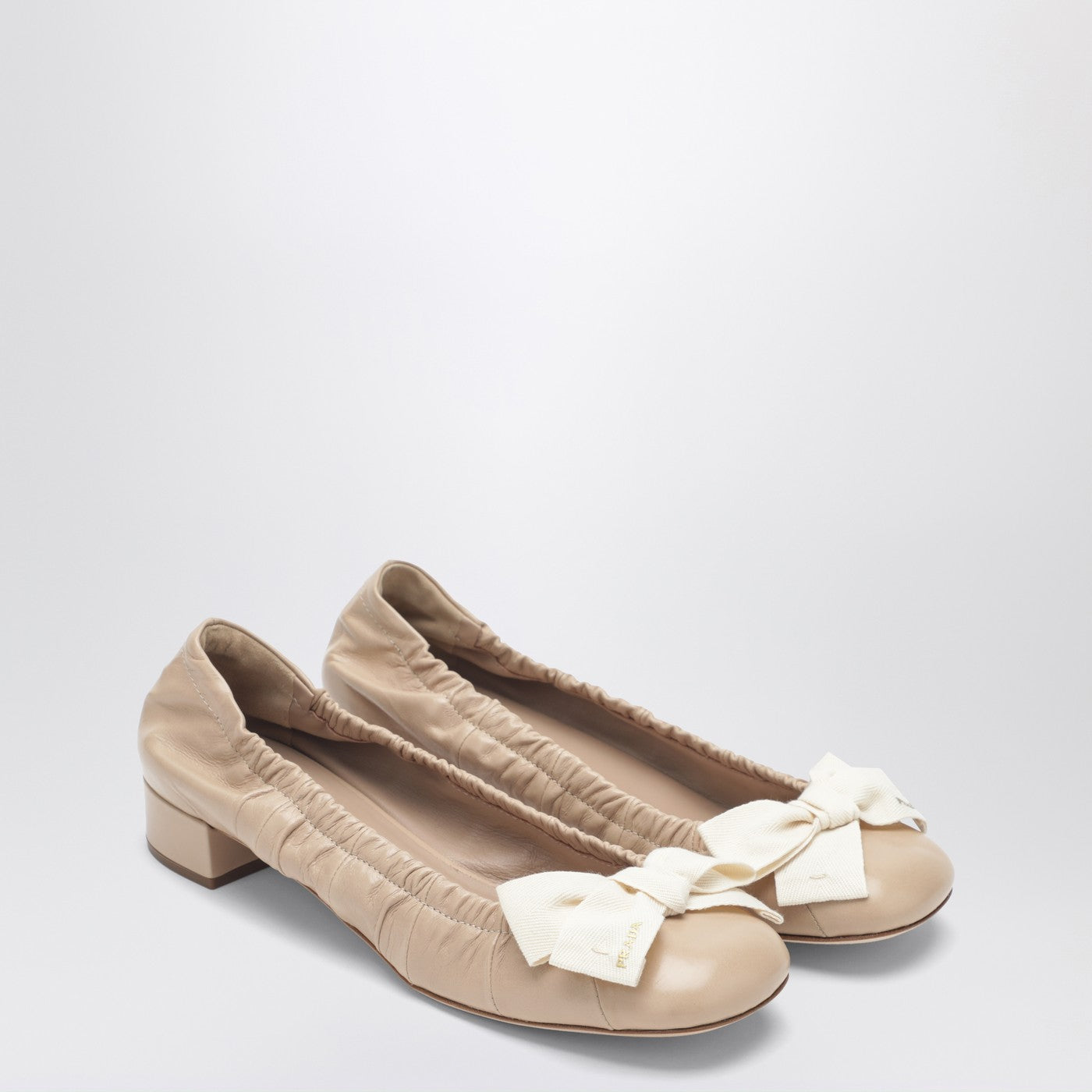 Sand-colored ballerina flats with maxi bow
