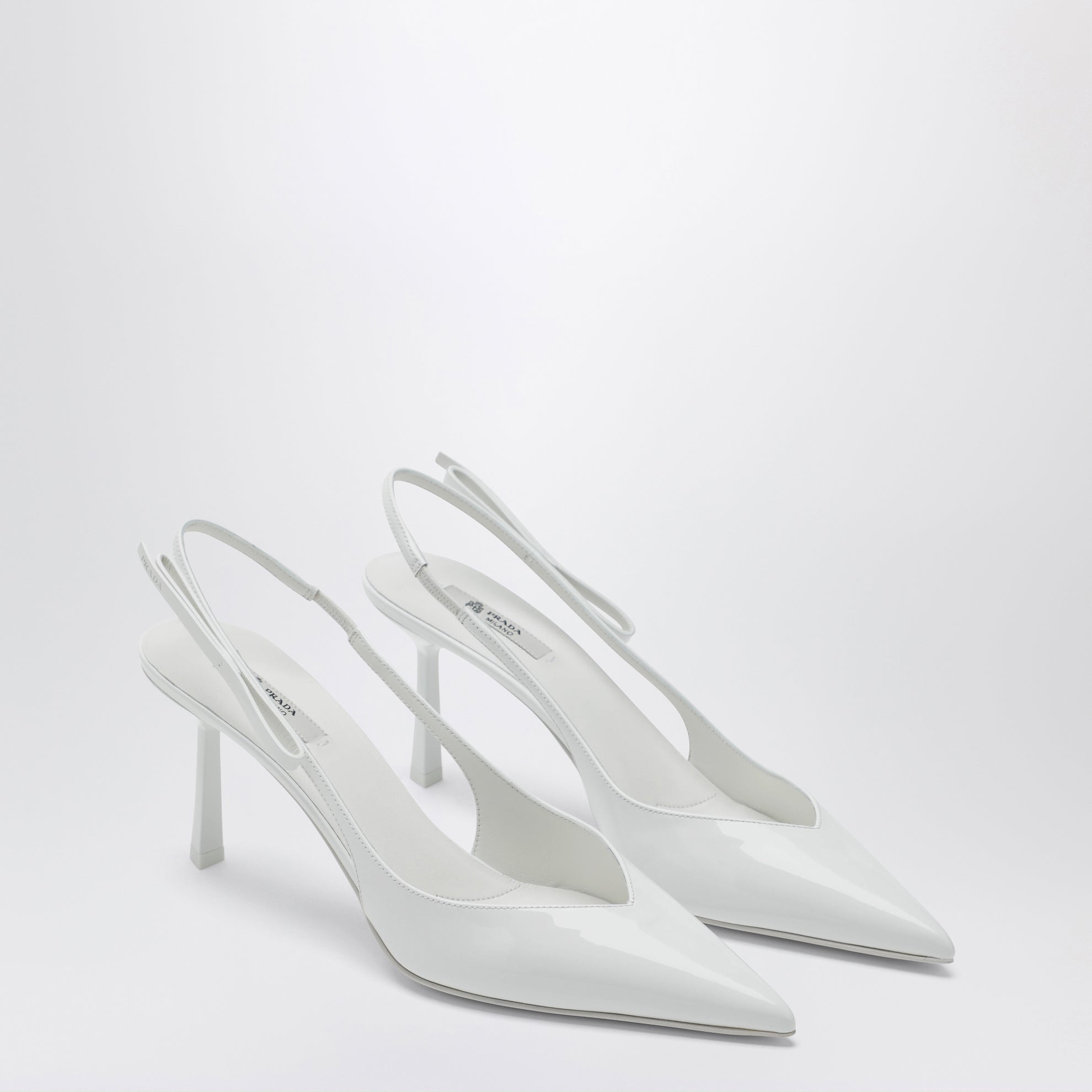 Décolleté slingback in pelle bianca