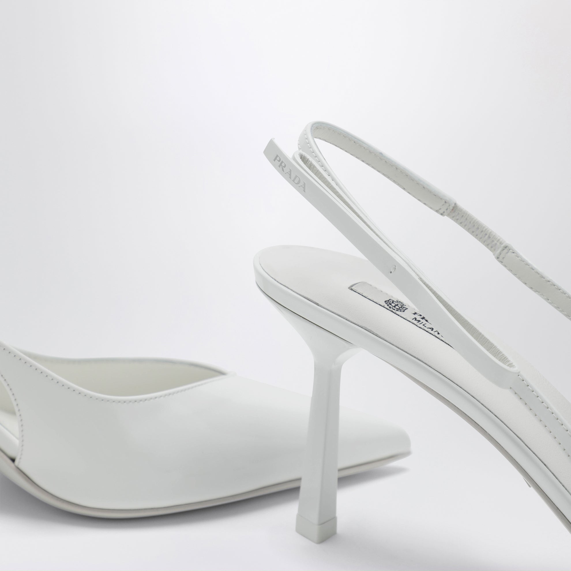 Décolleté slingback in pelle bianca