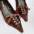 Coffee satin pumps decorated with feathers