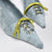 Astro satin pumps decorated with feathers