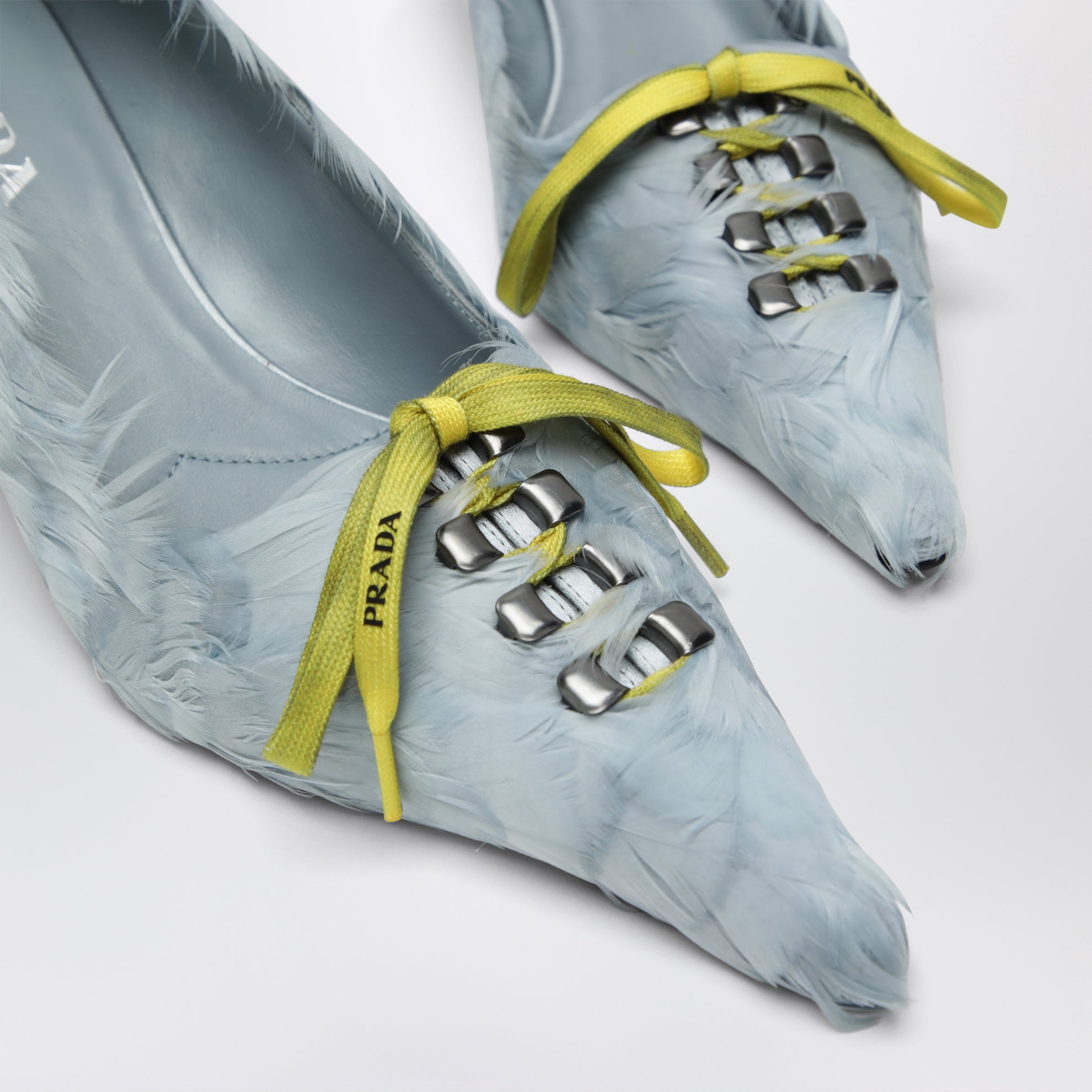 Astro satin pumps decorated with feathers