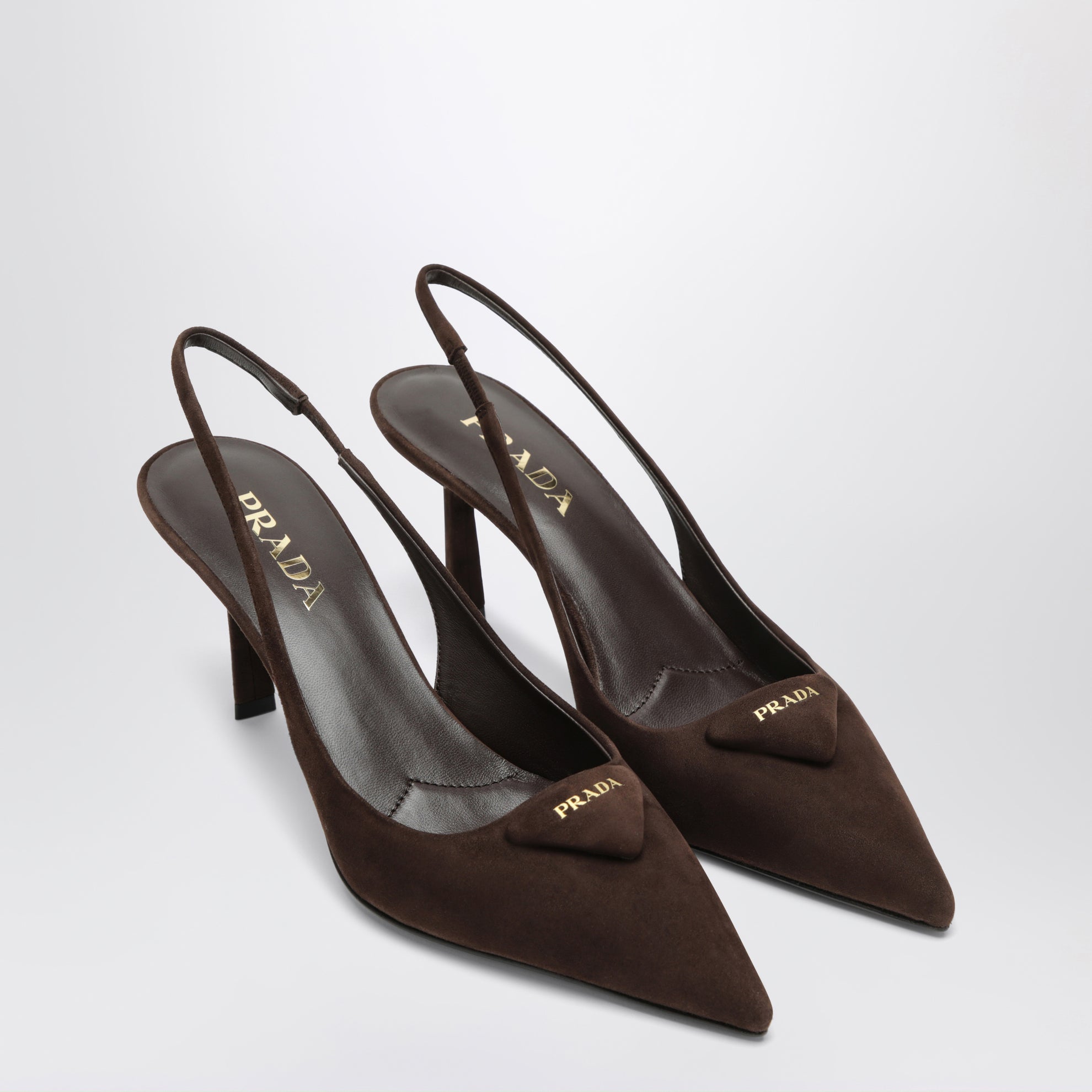 Dark brown suede slingback pumps