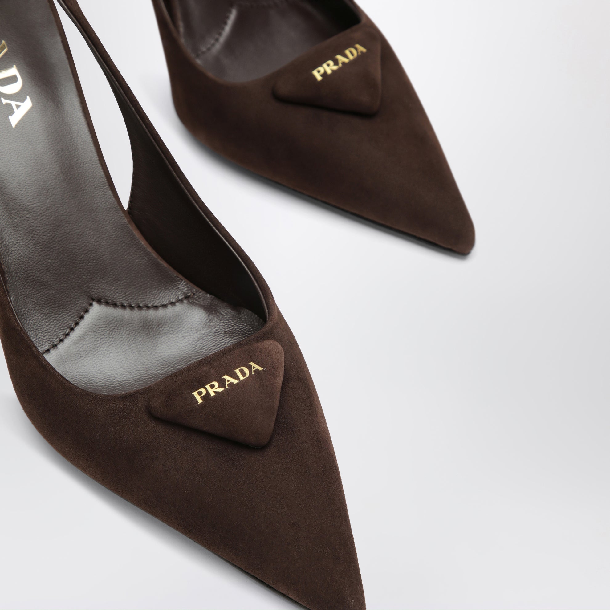 Dark brown suede slingback pumps