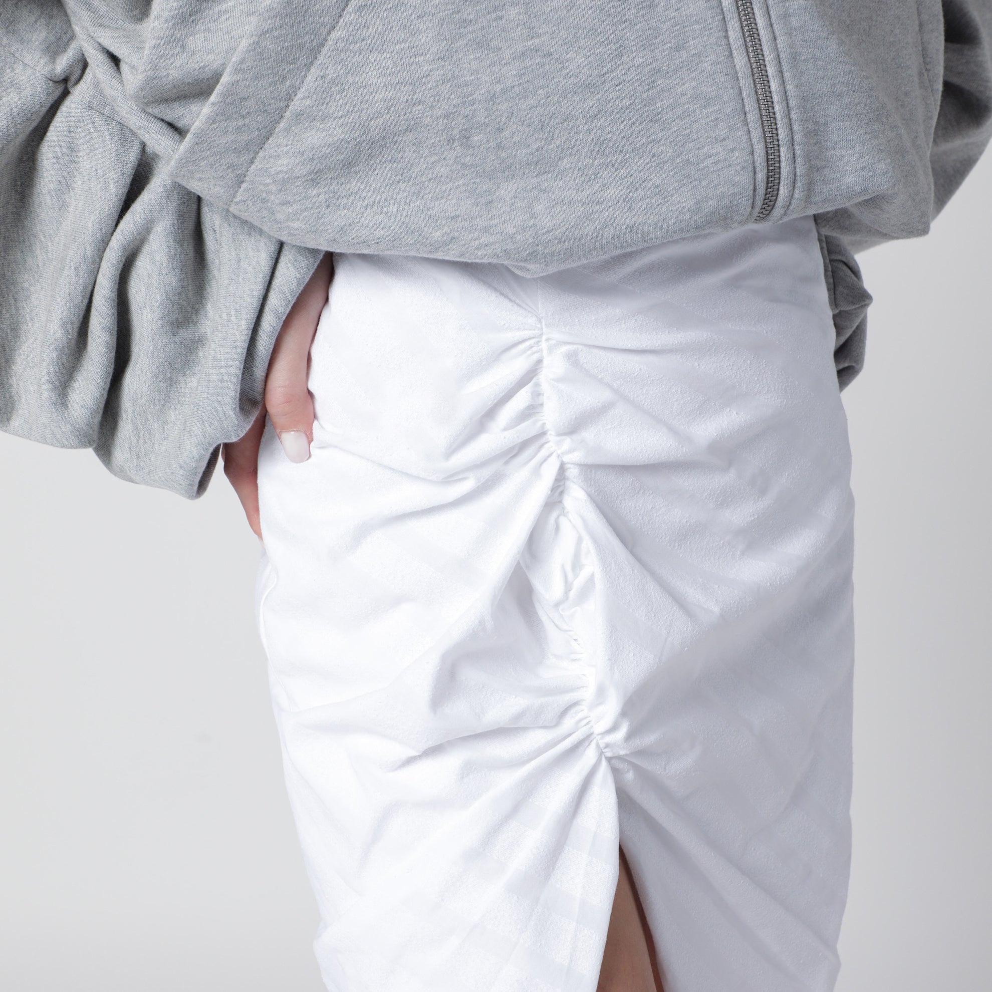 Mini-jupe asymétrique blanche en coton mélangé