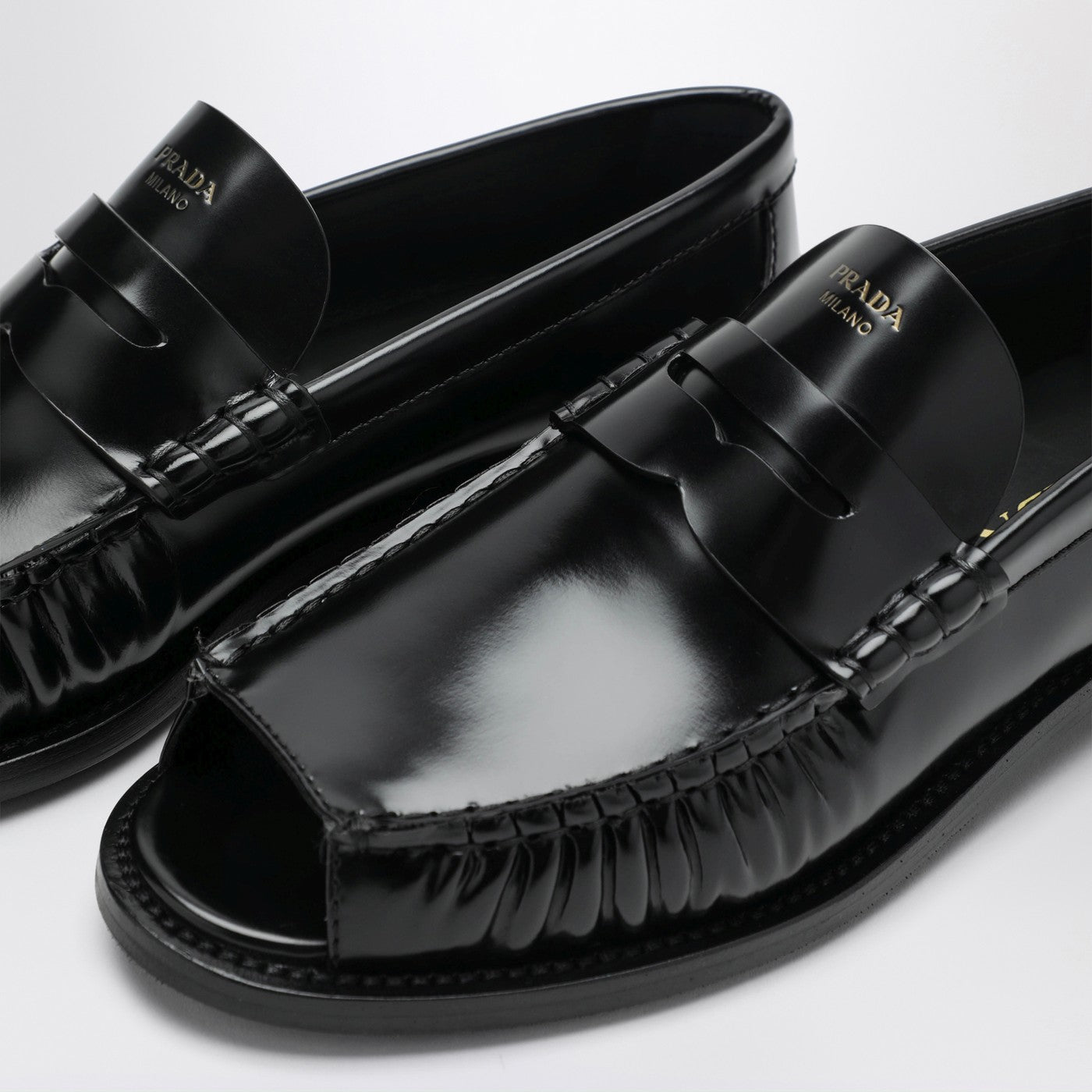 Prada Black brushed leather peep-toe loafers | TheDoubleF