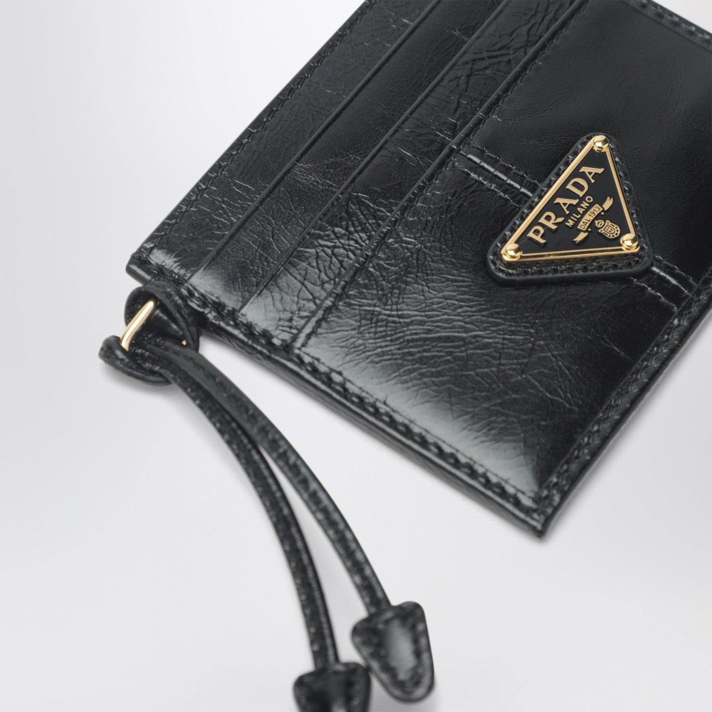 Porte-cartes en cuir noir avec logo triangle