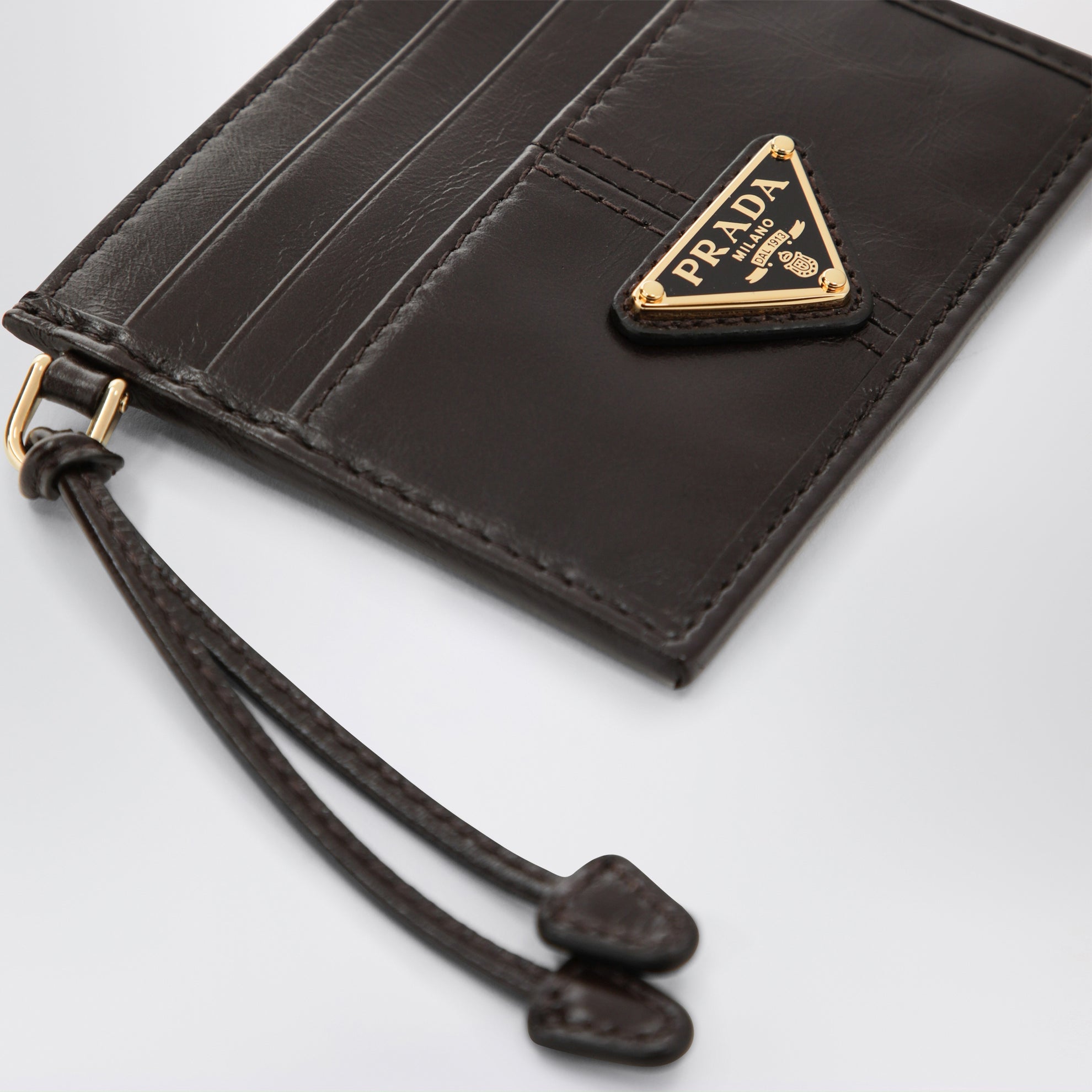 Porte-cartes en cuir couleur Marron foncé avec logo triangle