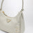Mini borsa Prada Re-Edition 2005 in Saffiano color talco