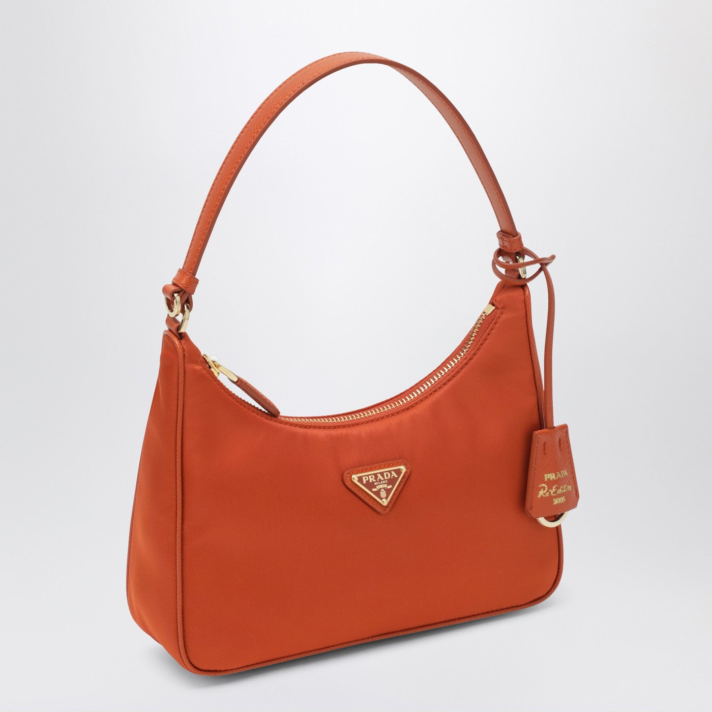 Re-Edition 2005 mini bag in papaya-colored Re-Nylon and Saffiano leather