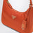 Re-Edition 2005 mini bag in papaya-colored Re-Nylon and Saffiano leather