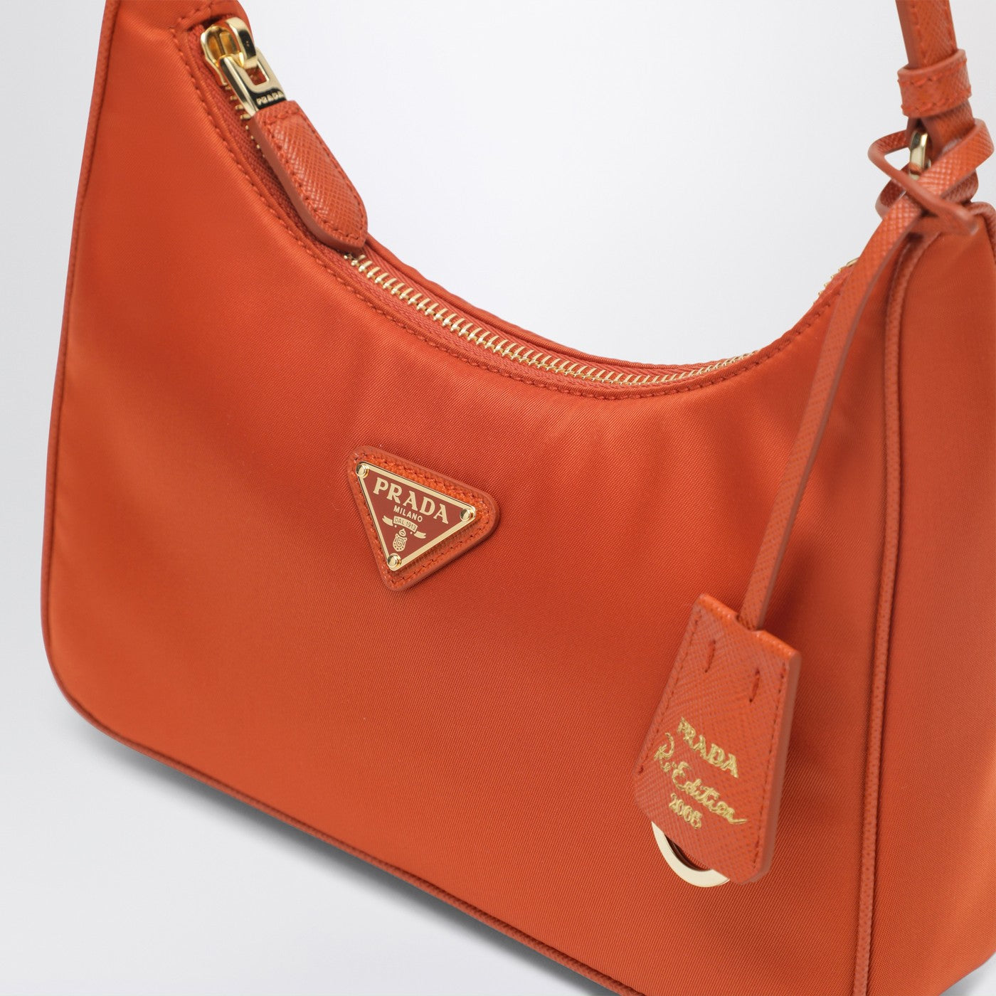 Re-Edition 2005 mini bag in papaya-colored Re-Nylon and Saffiano leather