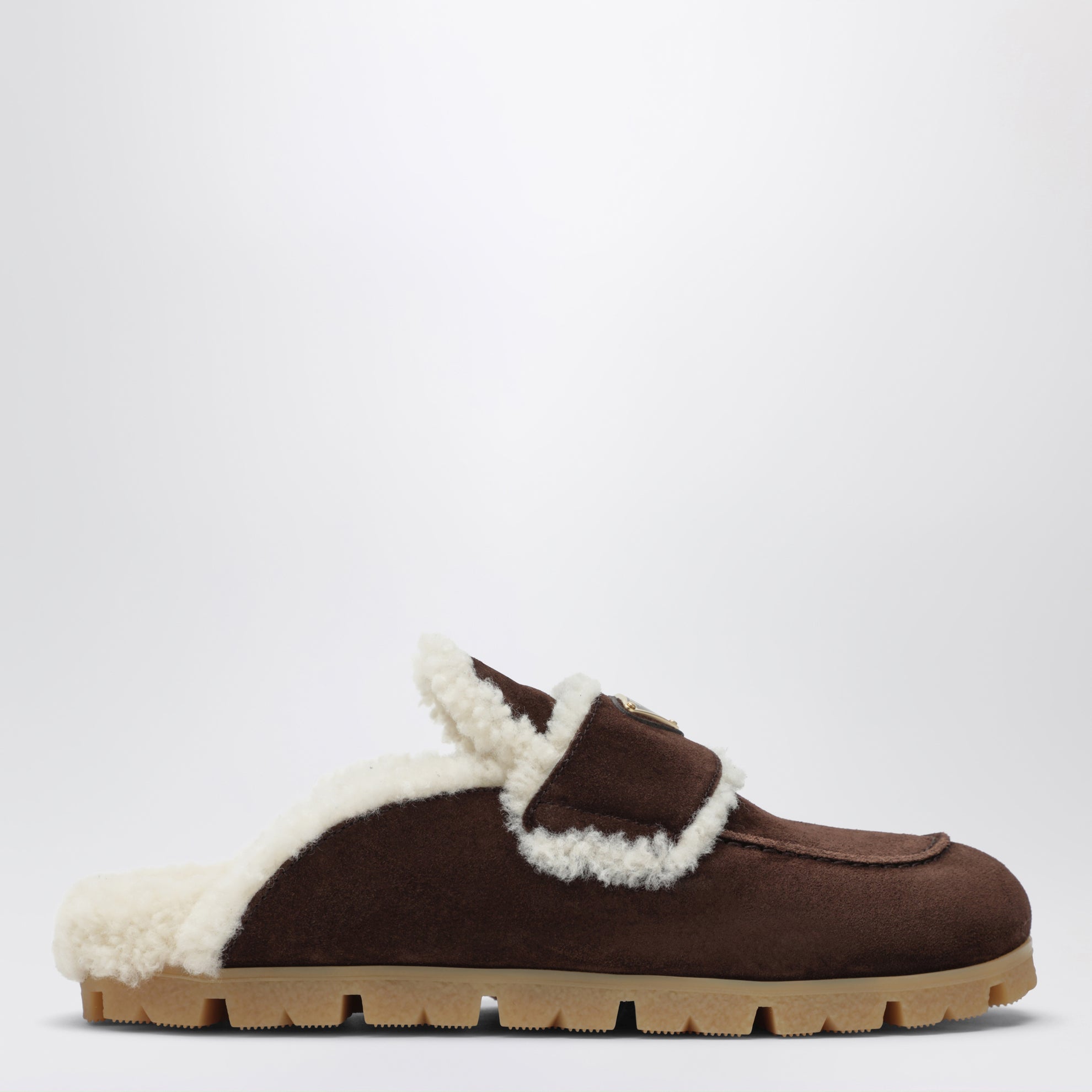 Brown suede and shearling clogs