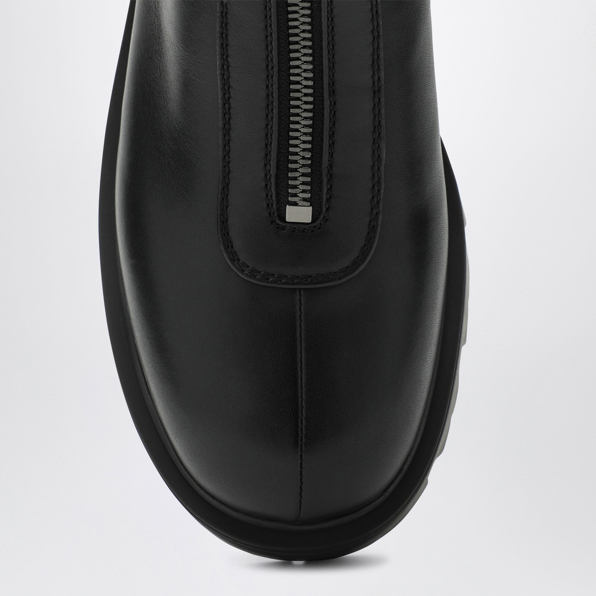 Black leather zip-up ankle boots