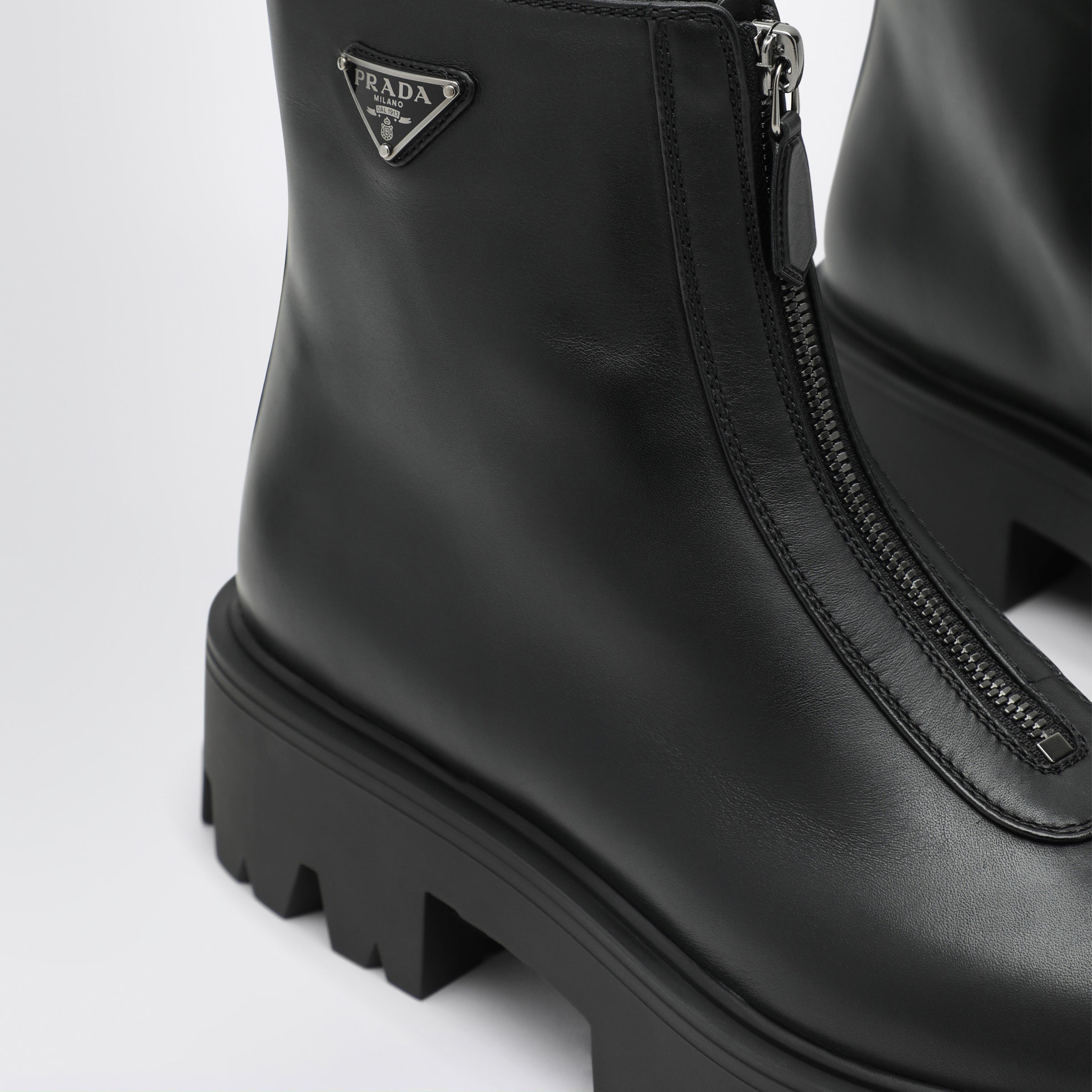 Prada Black leather zip-up ankle boots | TheDoubleF