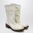 Talc-colored boots in aged-effect leather