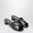 Black leather mules with triangular logo