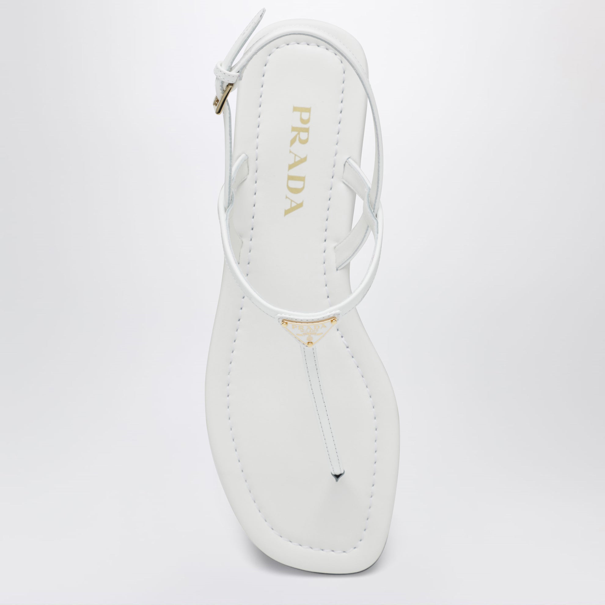 White patent leather thong sandals
