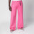 Pink jeans in washed denim