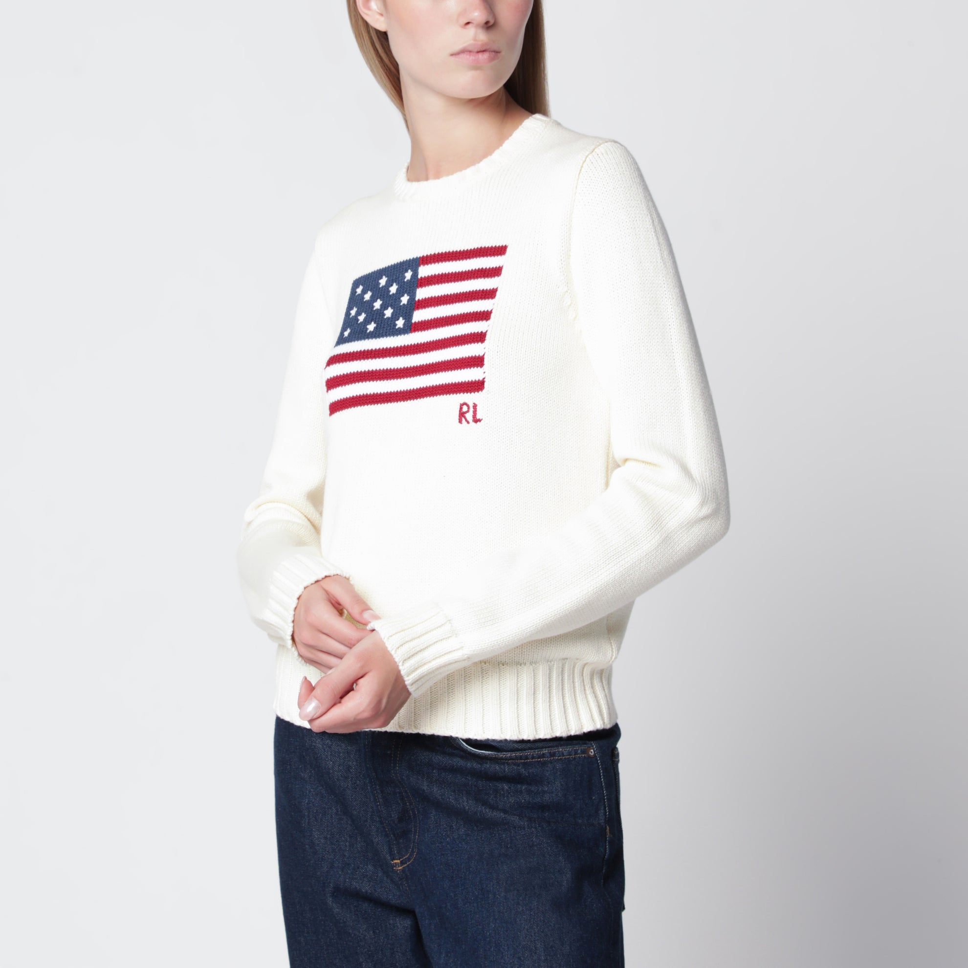 Maglione color crema con bandiera