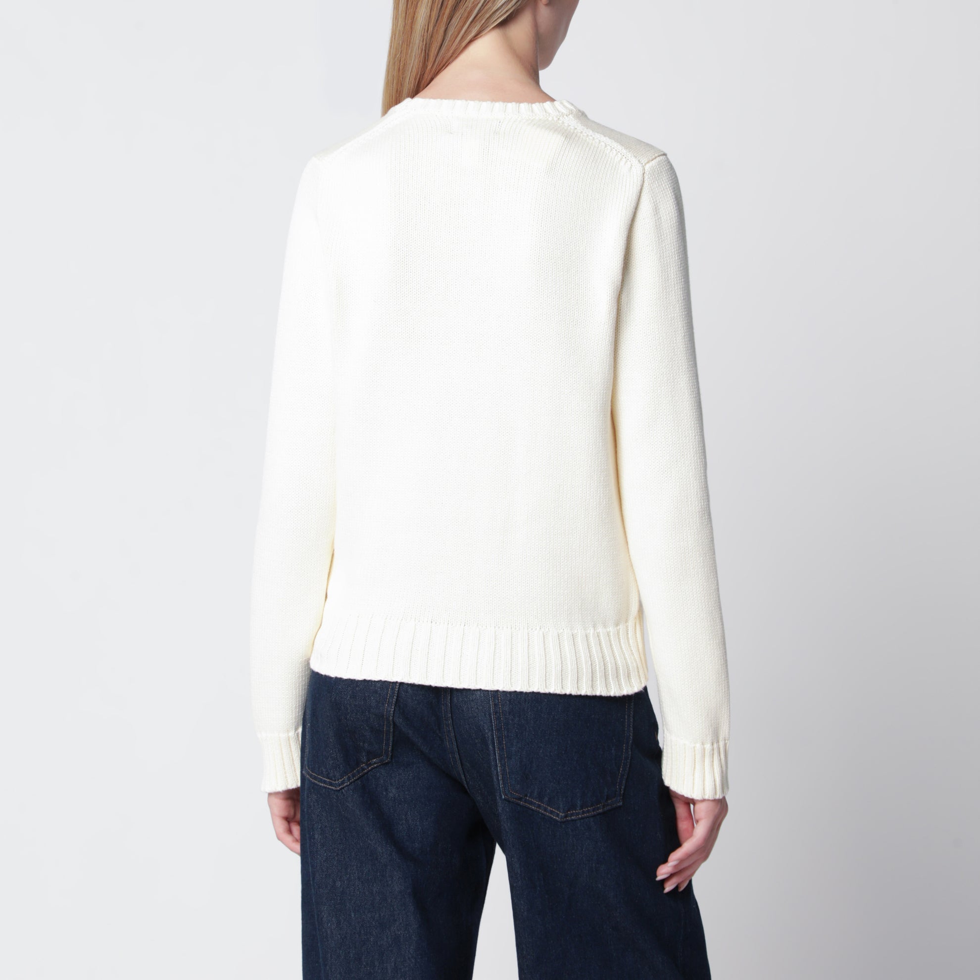 Maglione color crema con bandiera