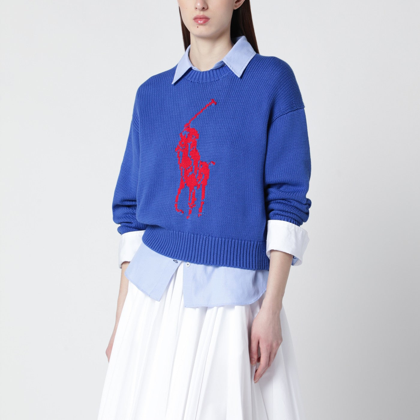 Purplish blue sweater with logo intarsia