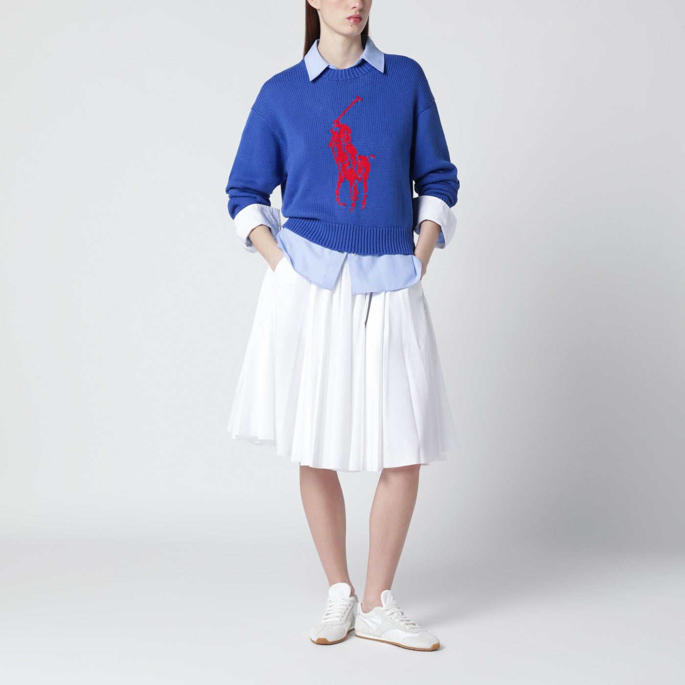 Purplish blue sweater with logo intarsia