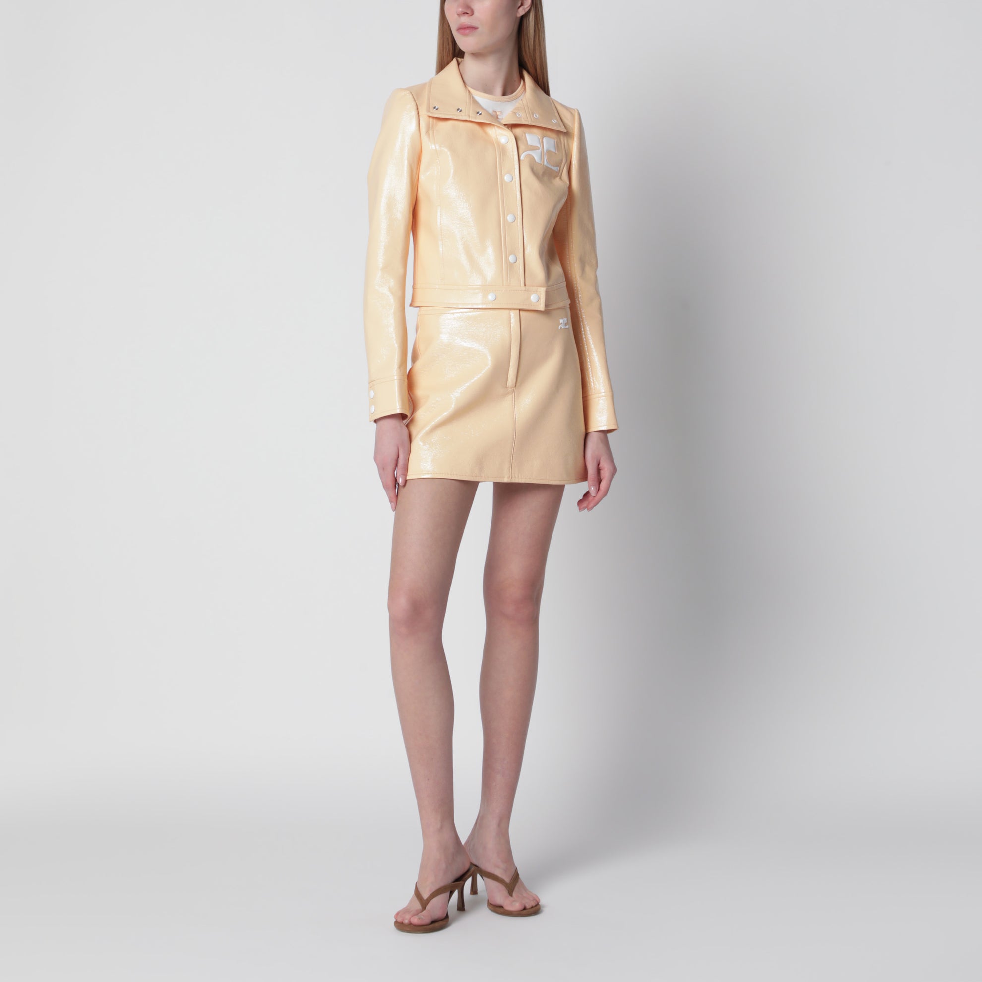 Reedition vinyl miniskirt in orange