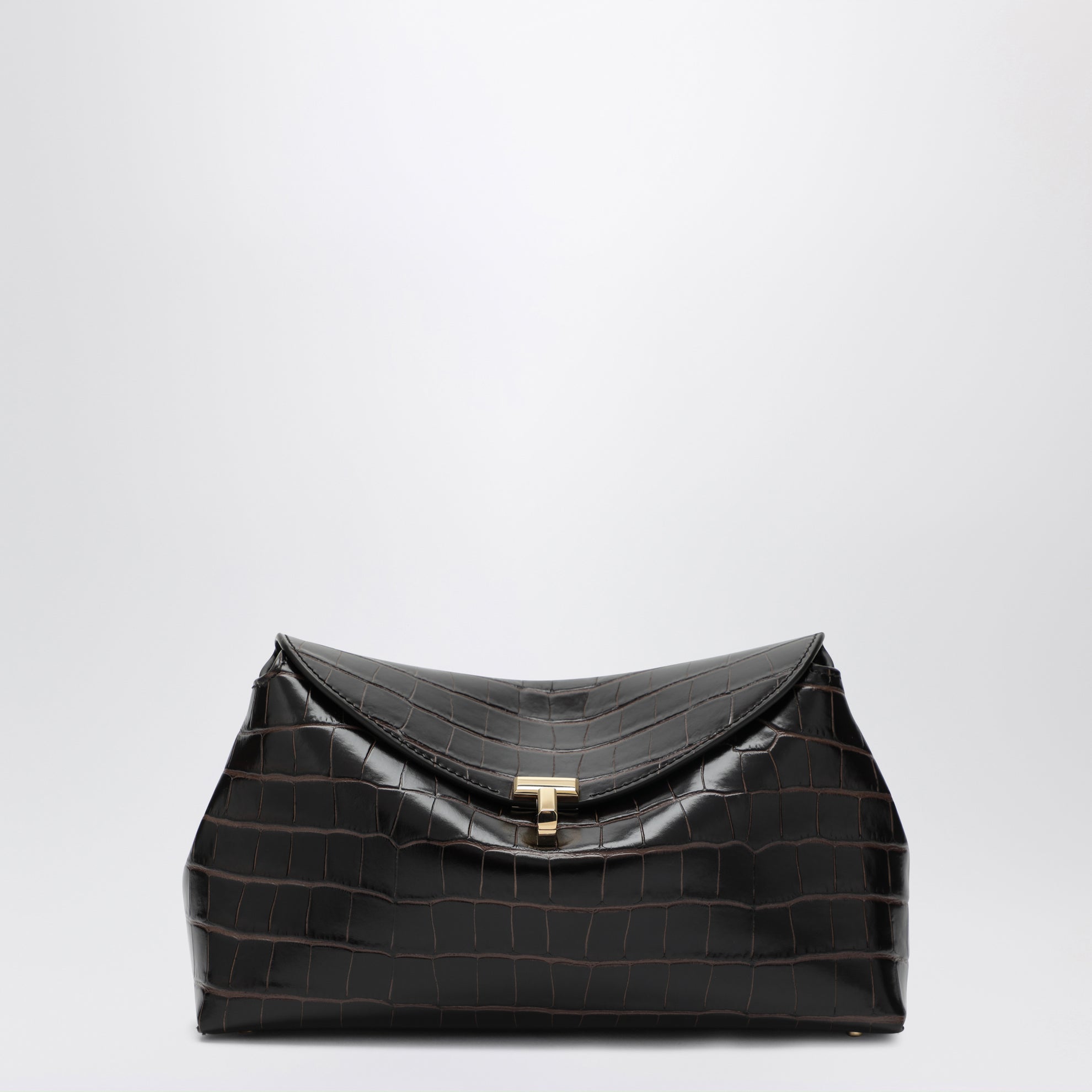 Brown T-lock clutch in crocodile-embossed leather