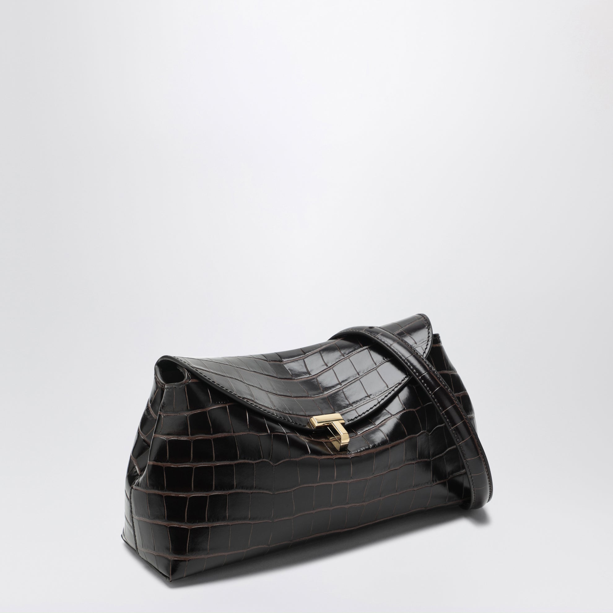 Brown T-lock clutch in crocodile-embossed leather