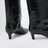 Black croc-embossed leather boots