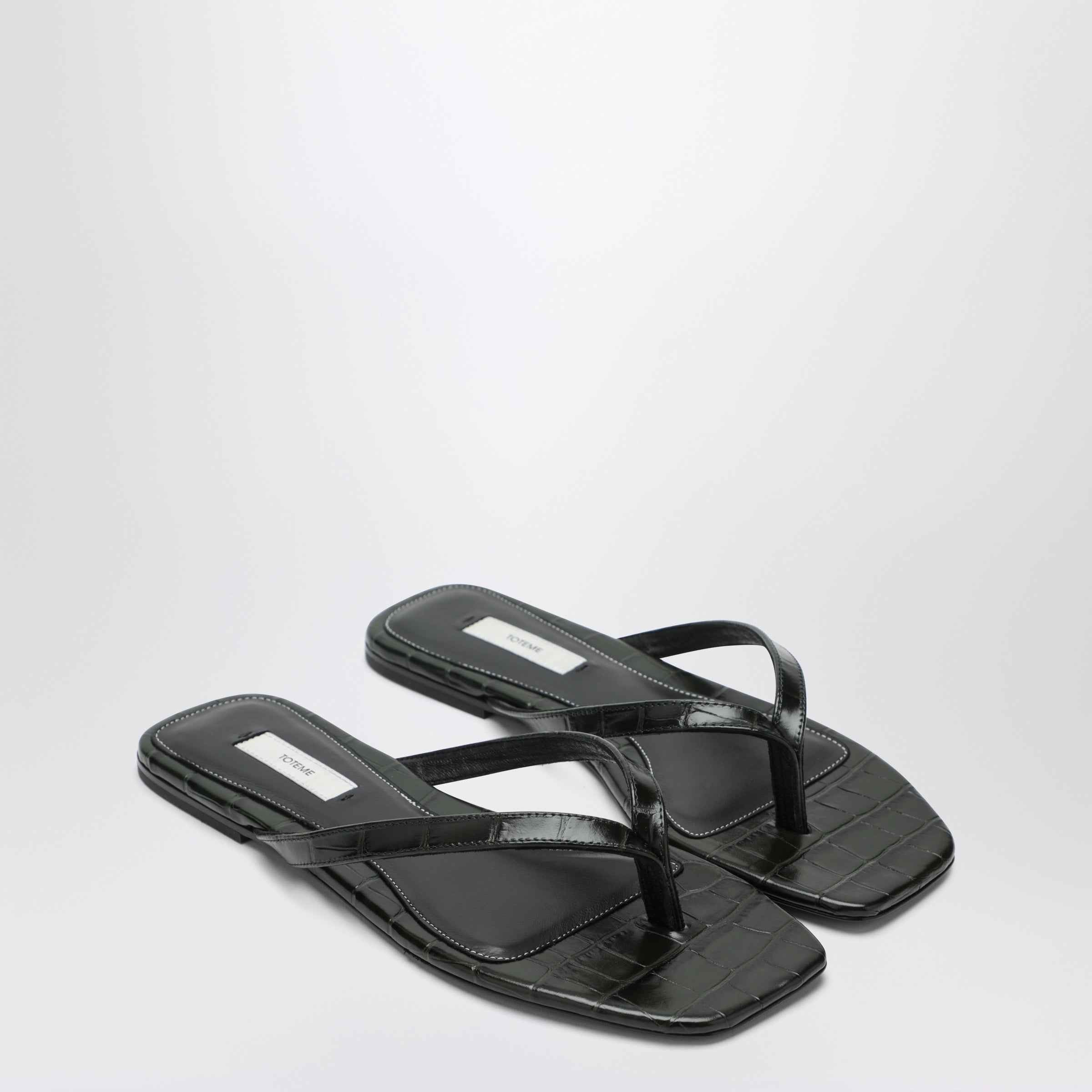 TOTEME Crocodile-effect leather flip-flops in green | TheDoubleF