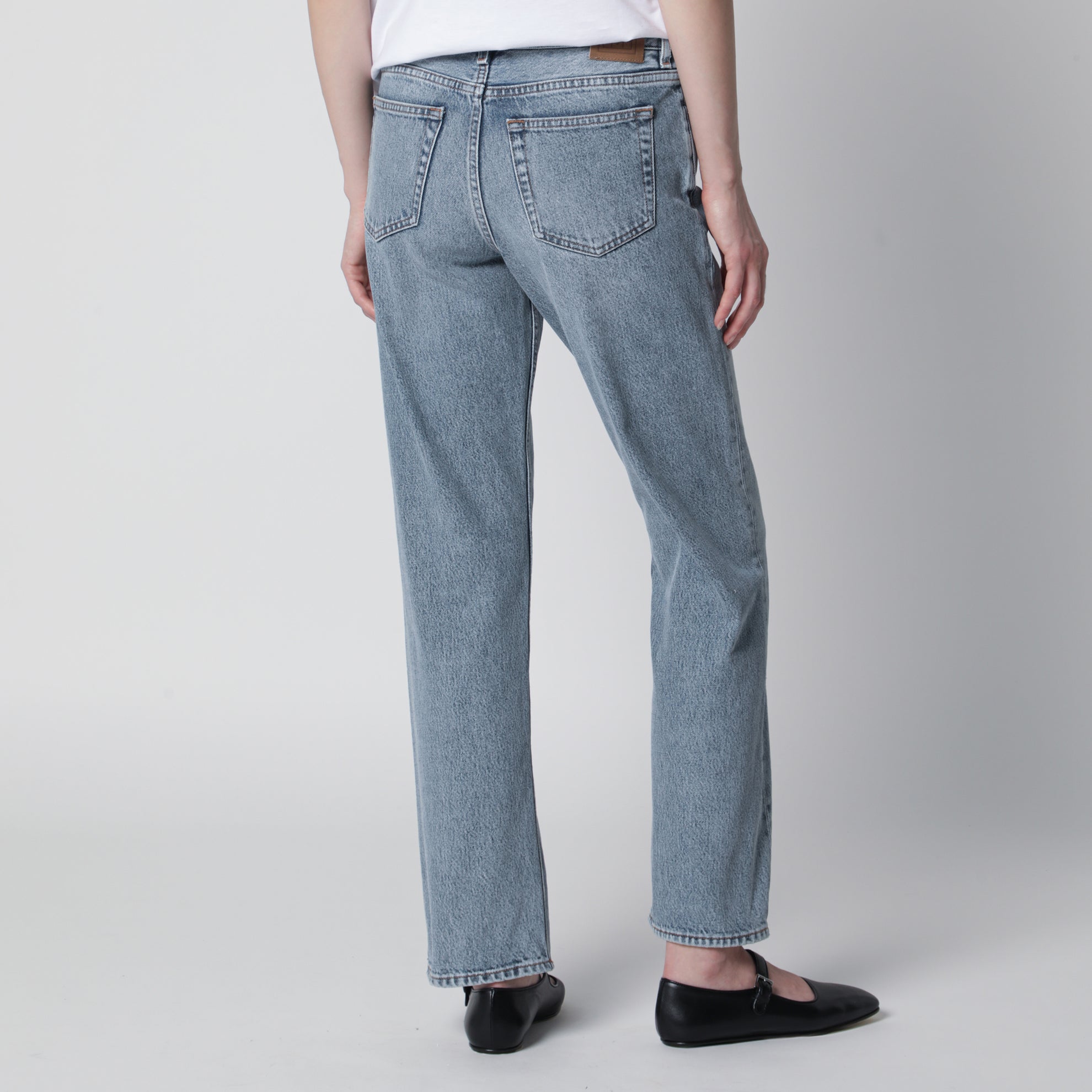 Jeans effetto slavato in denim organico