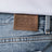 Jeans effetto slavato in denim organico
