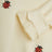 Sweat crème avec des coccinelles brodées