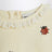 Sweat crème avec des coccinelles brodées