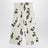 Wide white trousers with musical notes