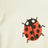 Ivory/red bodysuit with ladybug