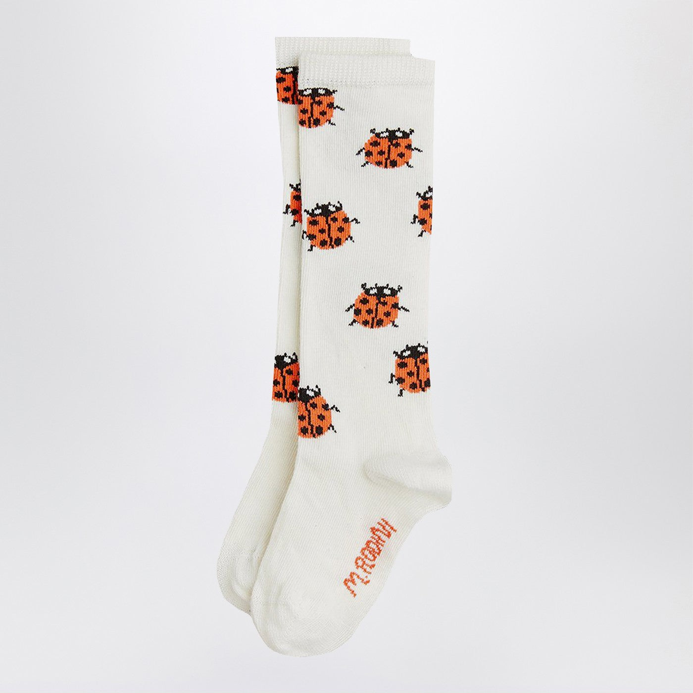 High white socks with ladybugs