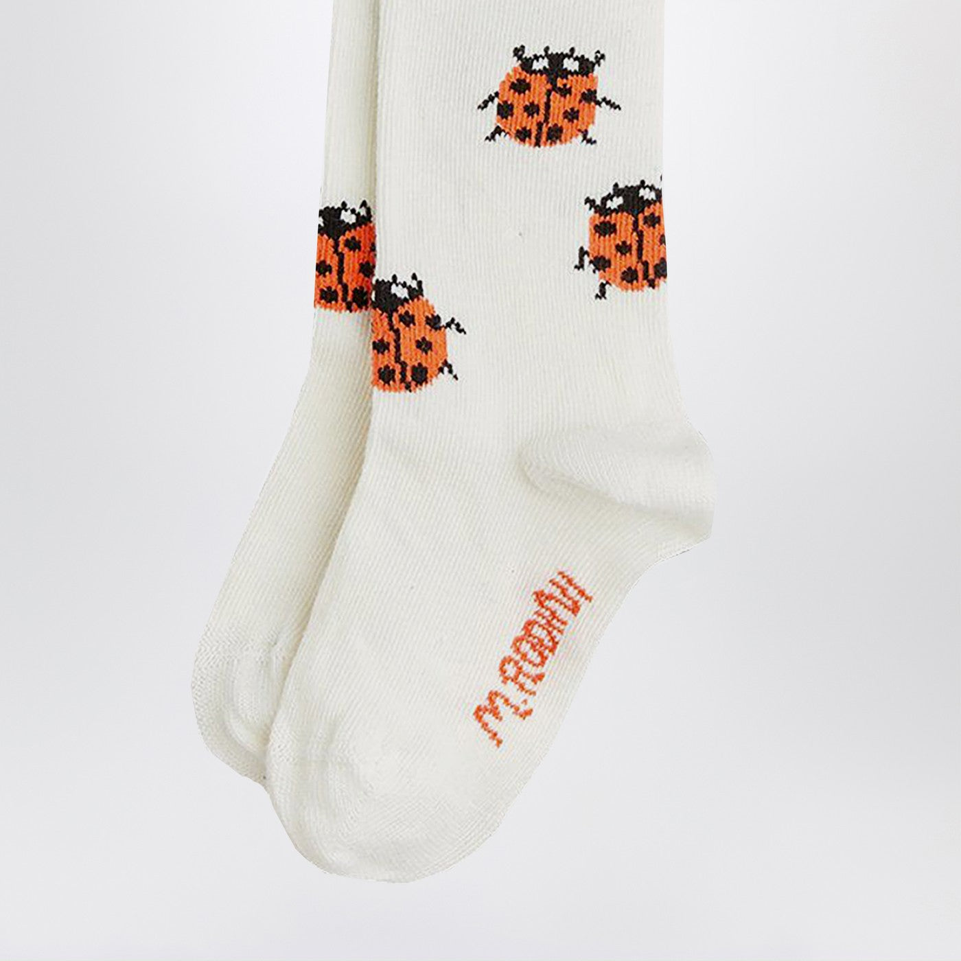 High white socks with ladybugs