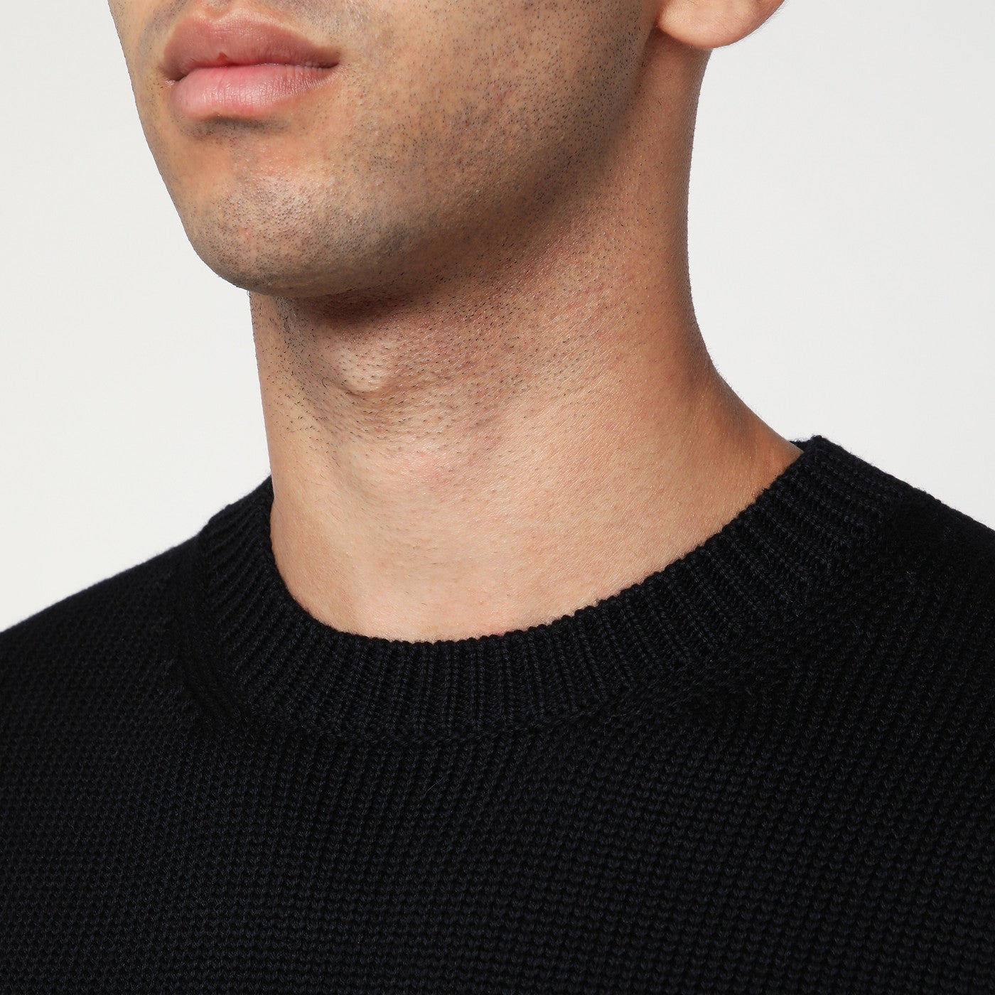 Black crew neck wool sweater