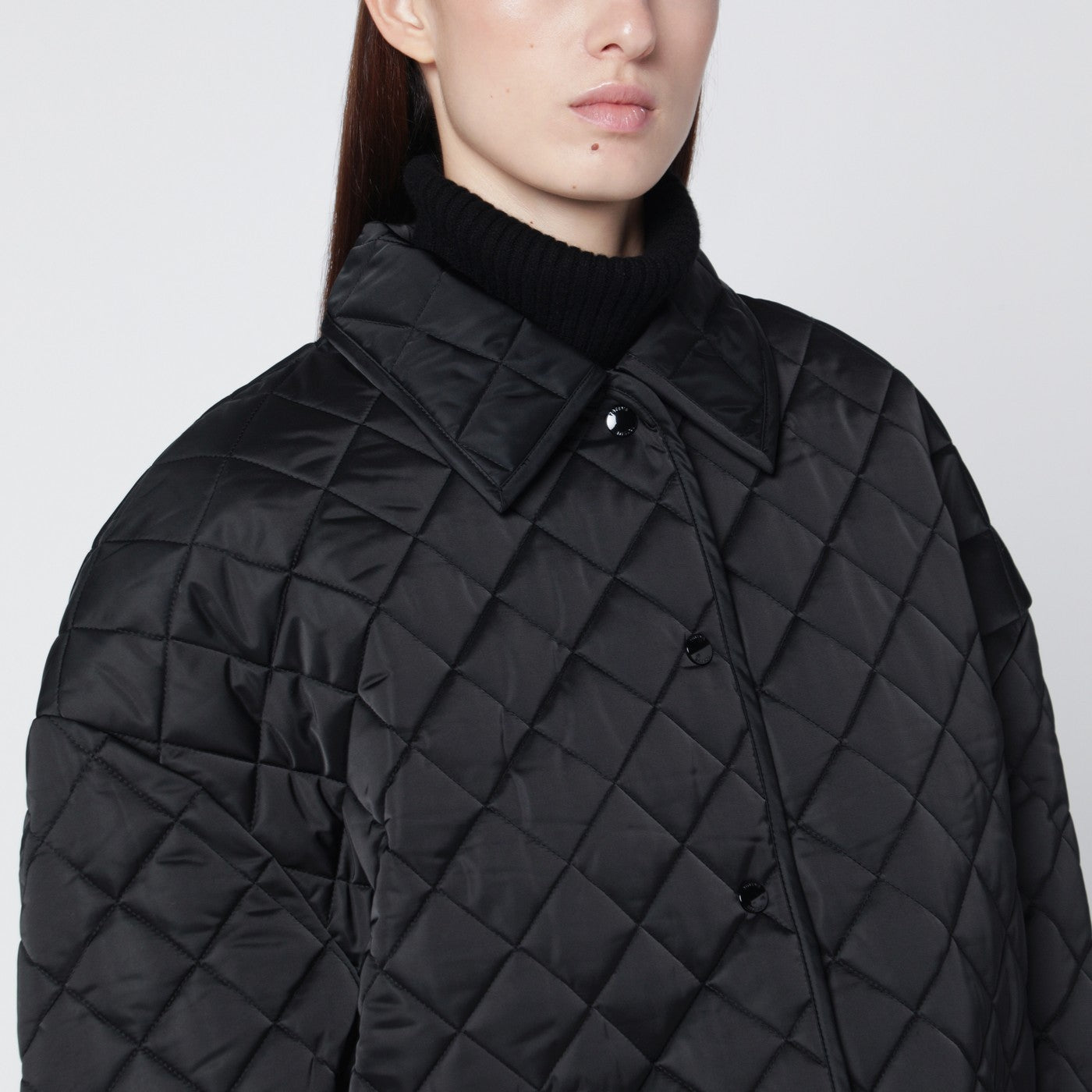 Black quilted jacket