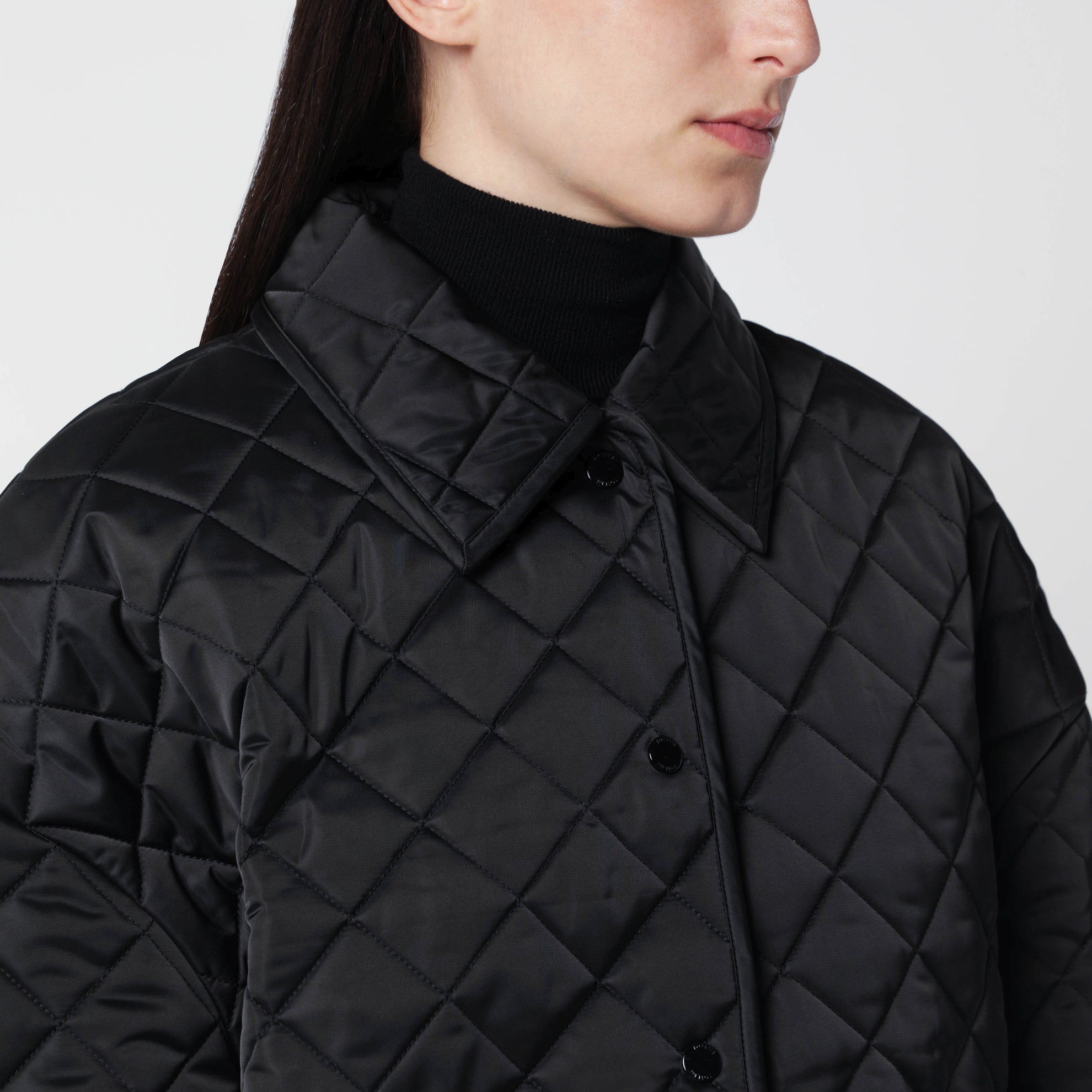 Black quilted jacket