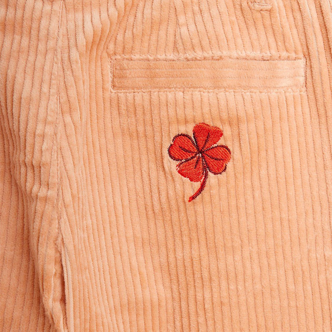 Pink corduroy trousers with suspenders