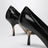 Schwarze Tourni-Pumps