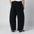 Pantalon noir en coton mélangé à jambe courbe