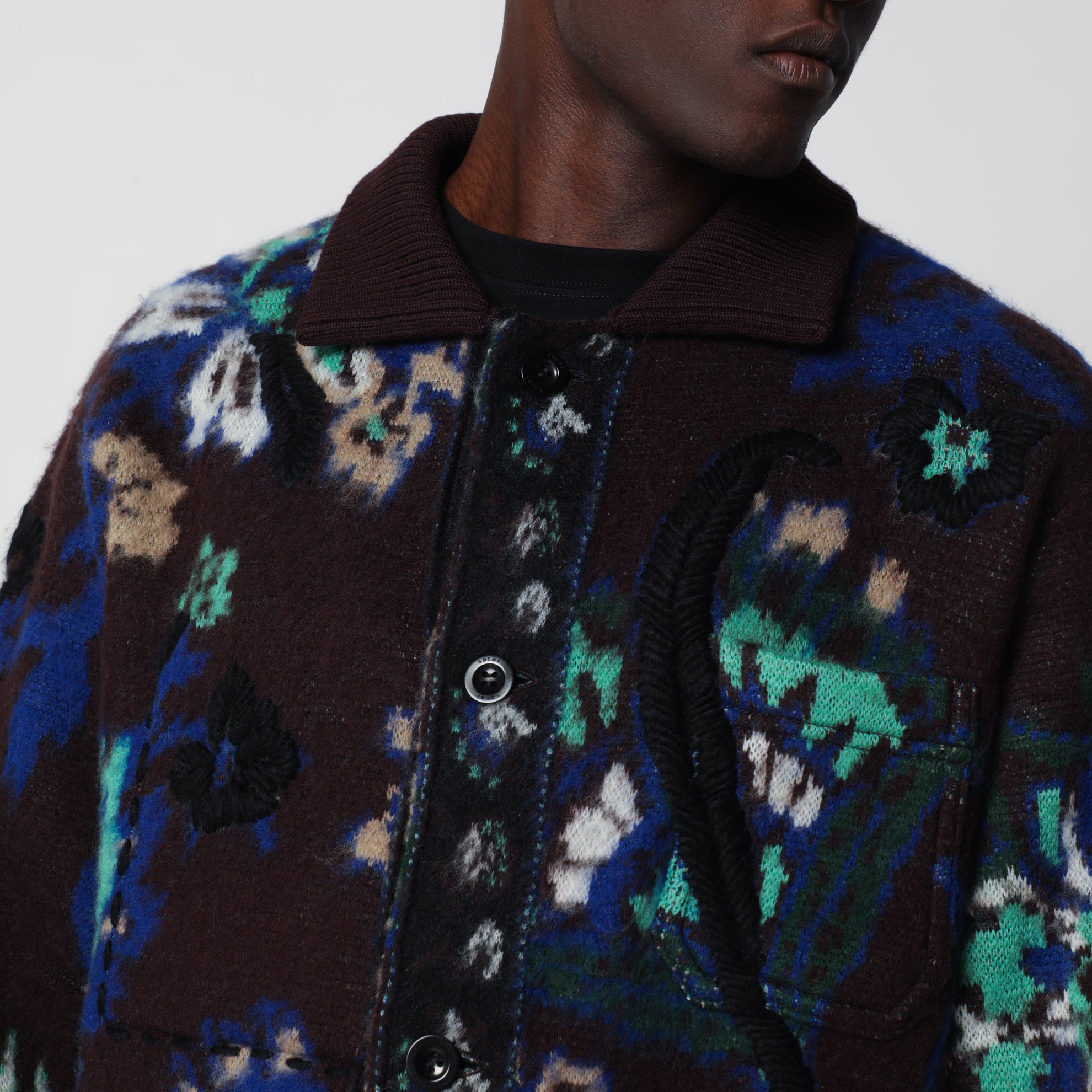 Brown wool jacket with floral pattern