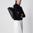 T-lock bag in black grained leather